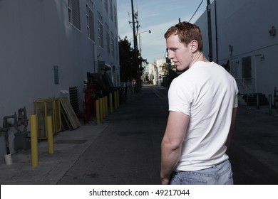 Man Looking Over His Shoulder