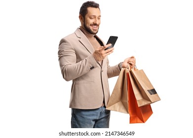 Man Looking At A Smartphone And Holding Shopping Bags Isolated On White Background