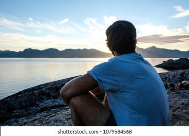 Man looking at the sunset
