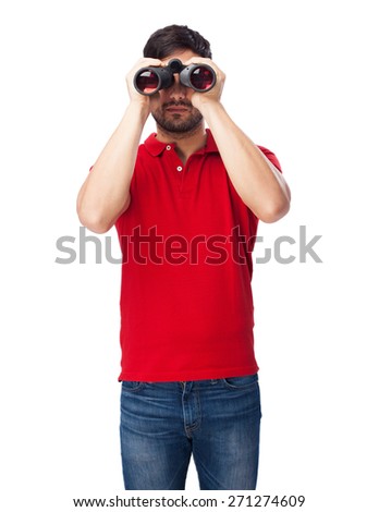 man looking through binoculars