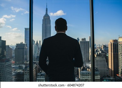 Man Looking Through The Window