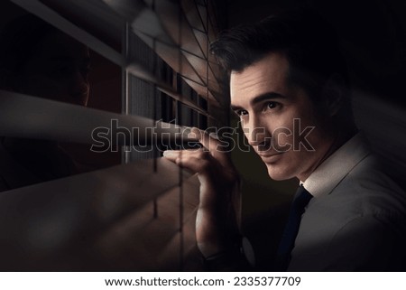 Man looking through window blinds at stranger in darkness. Paranoia concept