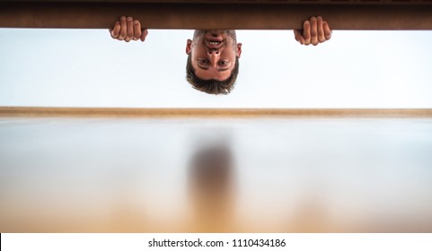 The Man Looking Under The Bed