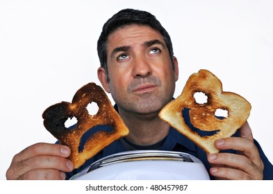 Man looks up   holds two different slices toast bread one and happy face   one and sad face  Man lifestyle concept  Real People  copy space