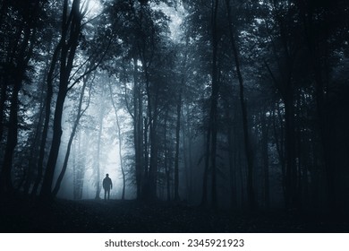 man lost in forest at night, scary dark landscape