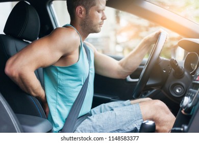 Man With Lots Of Back Pain After A Long Drive In Car