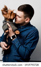 Man Loves His Dog Yorkshire Terrier. Loving Animals. Advert For Veterinarian And Vet Pharmacy