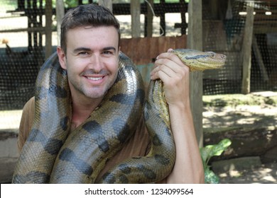 Man loving his gorgeous Anaconda 