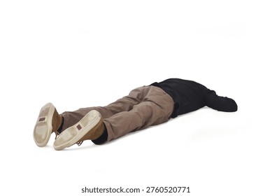 a man lying face down on the ground with his legs outstretched