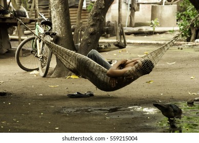 Man Lying Hammock In Venezuela, Poverty