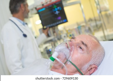 Doctor Looking Patient Wearing Oxygen Mask Stock Photo 701267257 ...