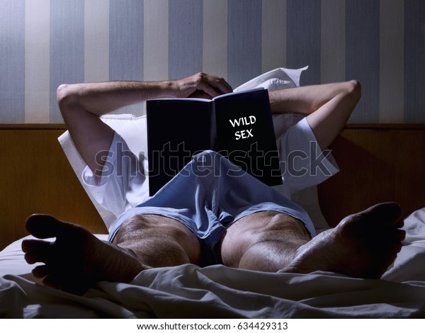 Man Lying On Bed Erection Reading Stock Photo (Edit Now) 634429313