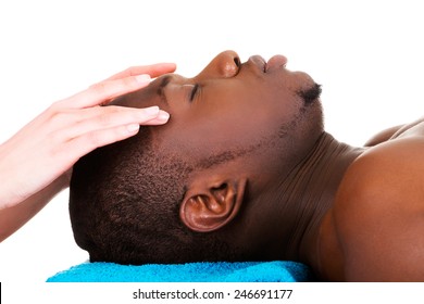 Man Lying On A Massage Table At Spa