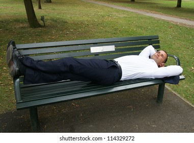 Man Lying On Park Bench Stock Photo 114329272 | Shutterstock