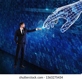 Man machine interaction between human and a digital hand - Powered by Shutterstock - Get 15% off with code: PIKWIZARD15