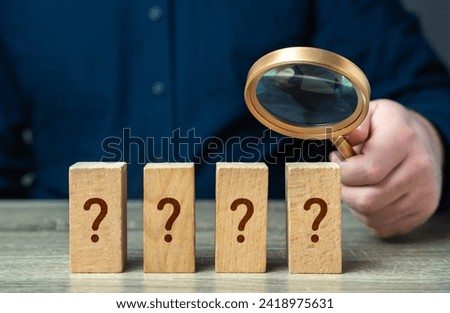 A man with a magnifying glass solves a mystery. Observation, attention to detail, and analytical thinking. Find clues, uncover hidden information. Patience, logical reasoning, systematic examination