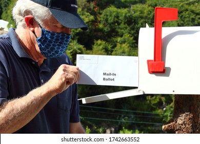 Man Mailing In A Ballot During The Covid-19 Pandemic