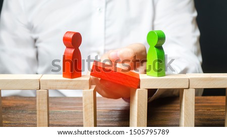 A man makes contact between people opponents. Arbitrator and mediator. Build bridges, seek a compromise in disputes and reconciliation of conflicts. Networking in business. Negotiation platform