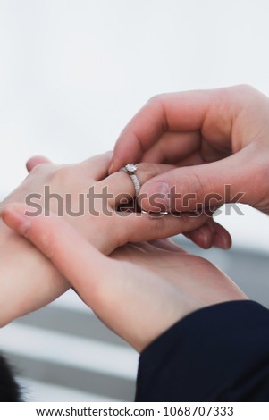 A man makes a proposal to a future spouse