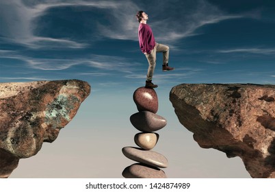 Man makes a step from a stack of stones to a mountain peak.