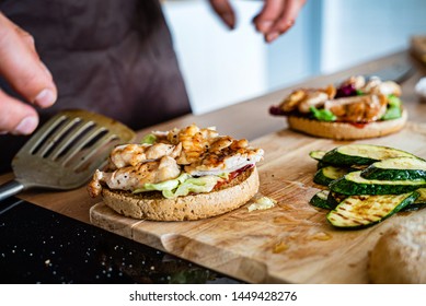 Man Making Burger On The Kitchen