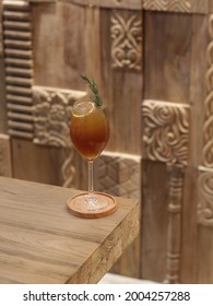 Man Making A Coffee Mocktail. Ingredients Tepache, Coffee, Soda Water With Rosemary