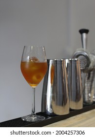 Man Making A Coffee Mocktail. Ingredients Tepache, Coffee, Soda Water With Rosemary