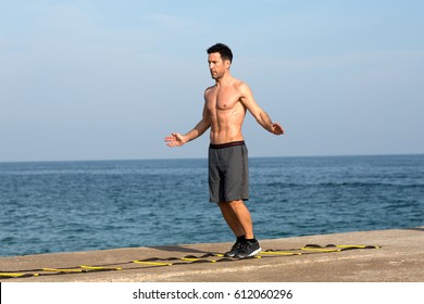 Man Making Drill Training On Agility Ladder 