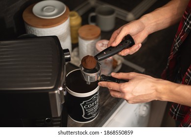 Man Making Espresso At His Coffee Station At Home. Selective Focus