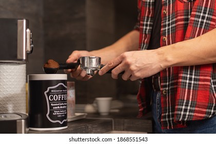 Man Making Espresso At His Coffee Station At Home.