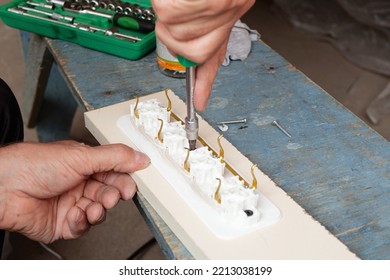 Man Making An Extension Cord Socket Outdoor.