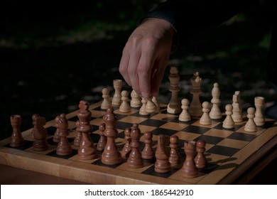 Man Making First Move In A Chess Game, Pawn Two Steps Ahead Seen From Blacks