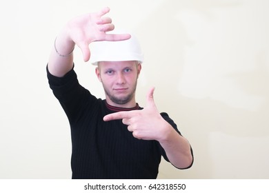 man making frame hand