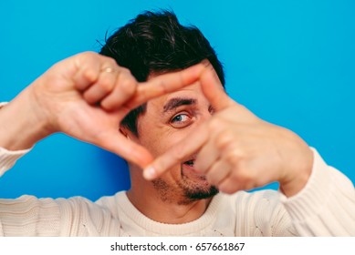 Man Making A Hand Frame