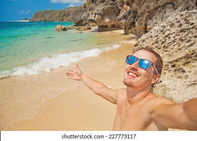 Man Making His Selfie On A Beach