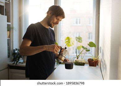 Man Making Morning Coffee In Moka Espresso Pot. Flavorful Coffee At Home Kitchen. Male Pouring Coffee In A Cup. Guy Morning Cozy Ritual. Breakfast Lighter Roast Blend. Home Leisure Fika At Holidays