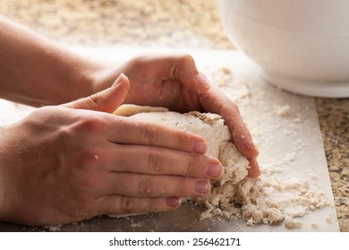 Man making pie crust from scratch - forming dough