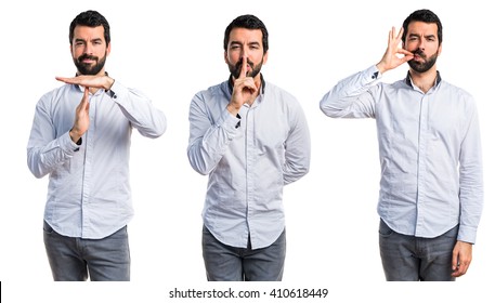 Man Making Silence Gesture