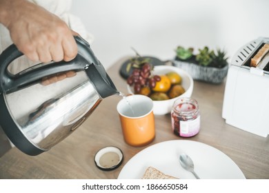 Man Making Tea At Home