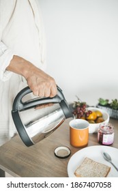 Man Making Tea At Home