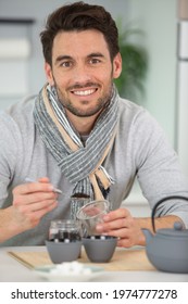 Man Making Tea At Home