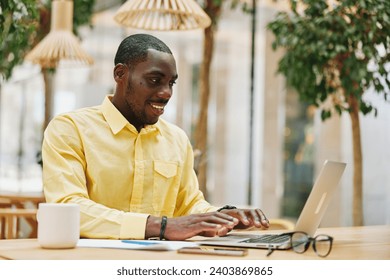 Man male office laptop technology adult business businessman working using young person computer - Powered by Shutterstock