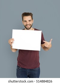 Young Man Holding Sign Studio Stock Photo (Edit Now) 1936424116