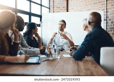 Man, manager and meeting or presentation in boardroom with coworkers for corporate business seminar. Discussion, financial and training for company growth with teamwork, leader and workshop mentor - Powered by Shutterstock