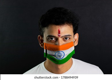 A Man With A Mask Indian Flag Printed On Mask For Indian Independence Day.