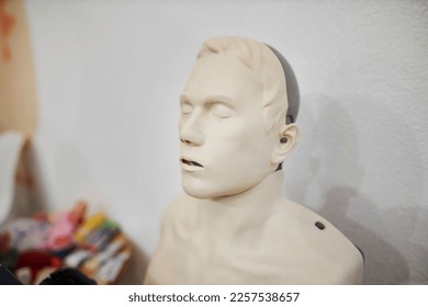 man medical mannequin for demonstrating the provision of cardiopulmonary resuscitation. medical mannequin for training. Futuristic patient works as a patient during medical simulation training. - Shutterstock ID 2257538657