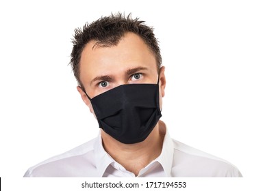 Man in medical mask with tousled hair Isolated on a white background. Concept on the topic of annoying quarantine and the inability to cut your hair - Powered by Shutterstock