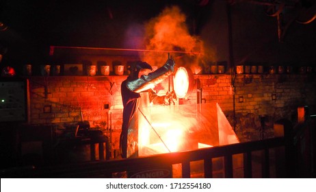 A Man Melting Gold At The Perth Mint.