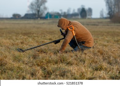 Man With Metal Detector
