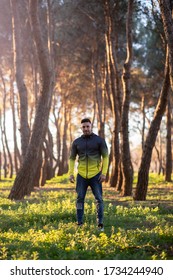 man in the middle of a forest